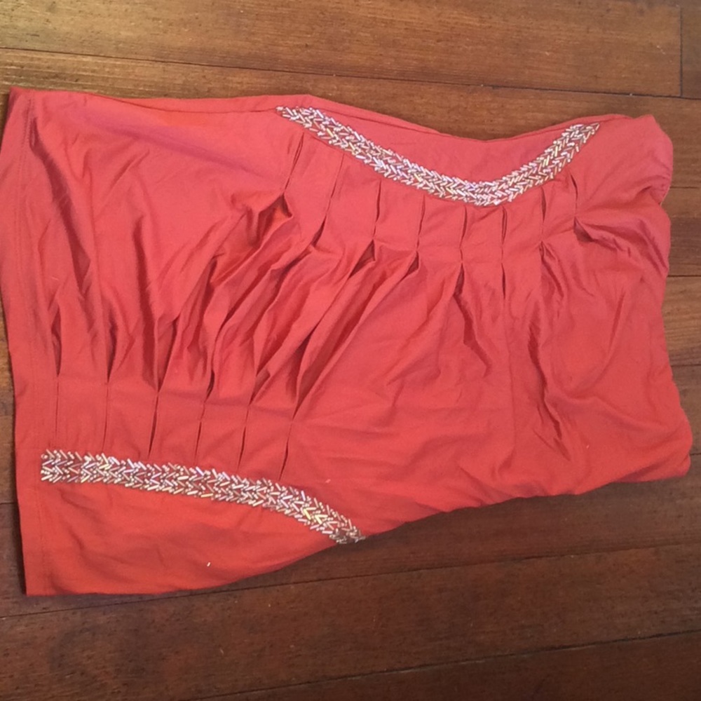 Nikibiki orange beaded tube dress.